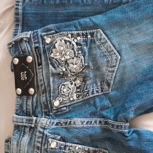 Floral print embellishments Miss Me boot cut jeans size 26 waist. 32 inseam,